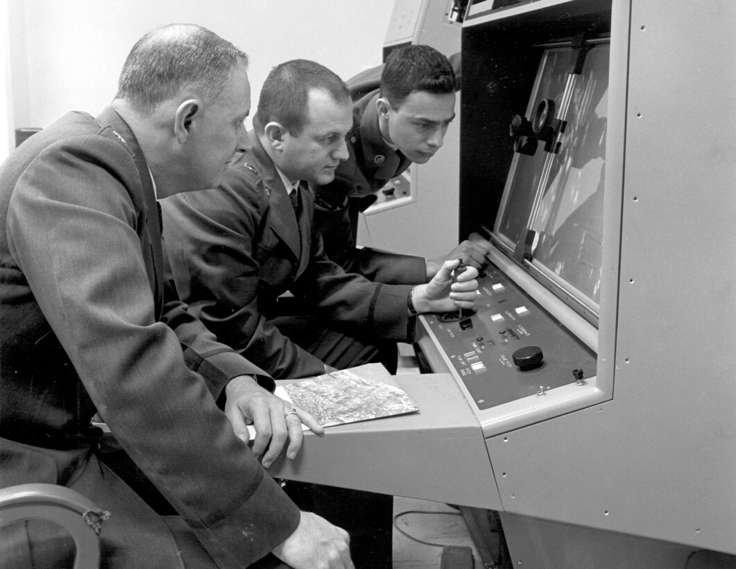 1960'S -- Strategic Air Command personnel interpreting reconnaissance photo during the Cuban Missile Crisis, 1962. (U.S. Air Force photo)