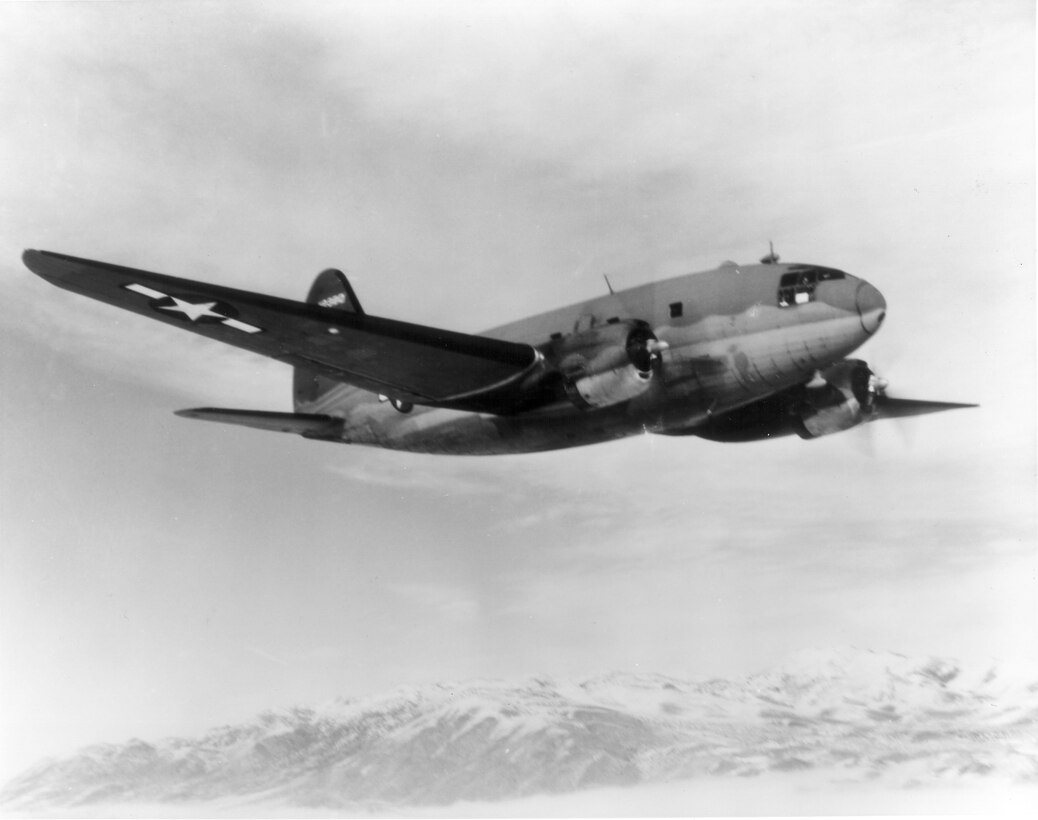 1940's -- Curtiss C-46 "Commando" in flight, response to the development of twin engine, low wing metal passenger planes in the mid-1930s (i.e. the Douglas DC-2). Curtiss designed the Model CW-20 as a passenger plane capable of carrying 36 passengers. (U.S. Air Force photo)