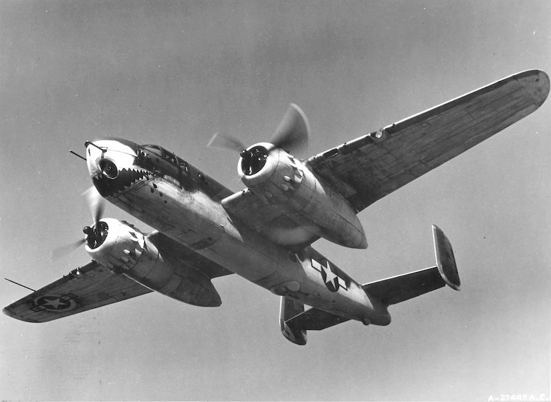 1940's -- North American's B-25G Mitchell from the AAF TAC Center, Orlando Florida. April 17, 1944. The crew of the B-25G was five--pilot, copilot, navigator/cannoneer, upper turret gunner, and radio operator.  Since there was no  bombardier, the pilot fired the nose armament and released the bombs.  The radio operator also doubled as the ventral turret gunner when this turret was fitted.  Additional armor was fitted forward of the  instrument panel, forward of the loader's station, around the 75-mm ammunition rack, and below the windshield.  An external flak plate was fitted below the cockpit on the left hand side of the aircraft. (U.S. Air Force photo)