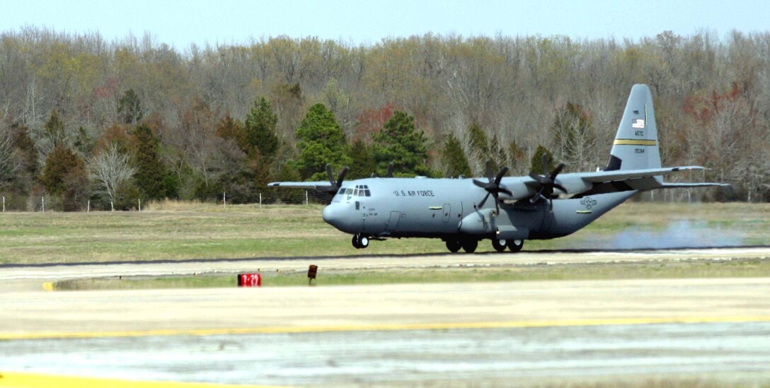 LITTLE ROCK AIR FORCE BASE, Ark. -- The Air Force's first newest C-130J Hercules touches down here March 19 after flying from the Lockheed Martin production plant on Dobbins Air Reserve Base, Ga.  This aircraft is the first J model assigned to an active-duty unit.  (U.S. Air Force photo by Senior Airman Jason A. Neal)