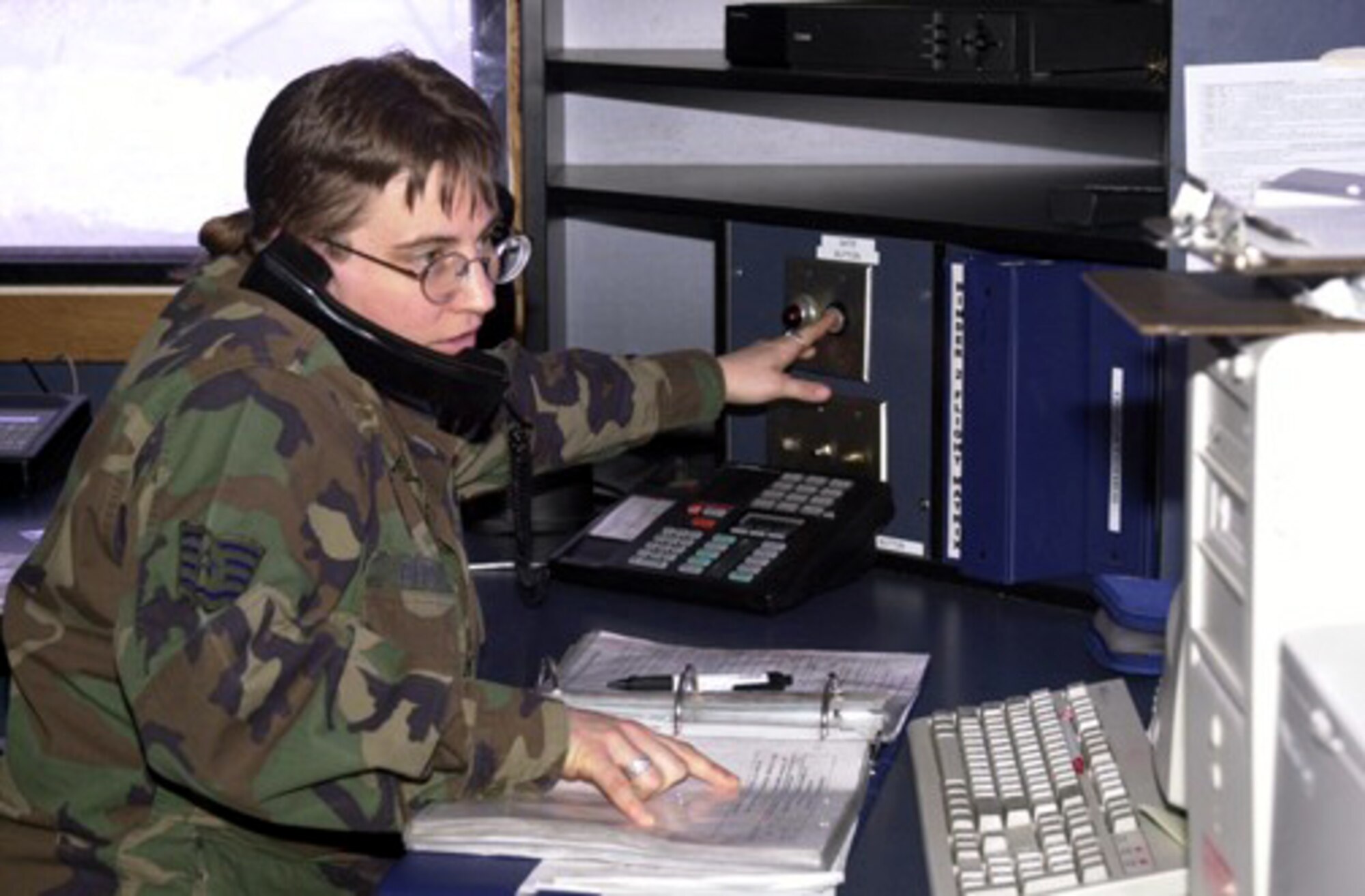 NORTH DAKOTA -- Staff Sgt. Barbara Barron investigates the cause of an alarm activation at a missile launch facility.  She is a flight security controller assigned to the 91st Missile Security Forces Squadron at Minot Air Force Base, N.D.  (U.S. Air Force photo by Tech. Sgt. Gino Mattorano)