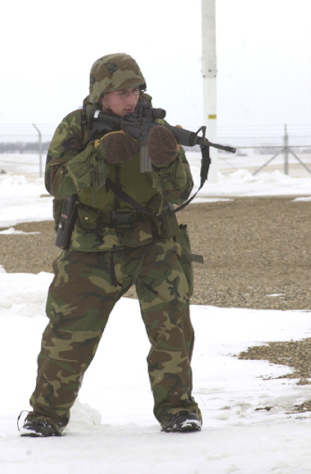 NORTH DAKOTA -- Airman 1st Class Stanley Graham conducts a sweep of a missile launch facility to ensure the area is secure.  Airman Graham is a security response team member assigned to the 91st Missile Security Forces Squadron at Minot Air Force Base, N.D. (U.S. Air Force photo by Tech. Sgt. Gino Mattorano)