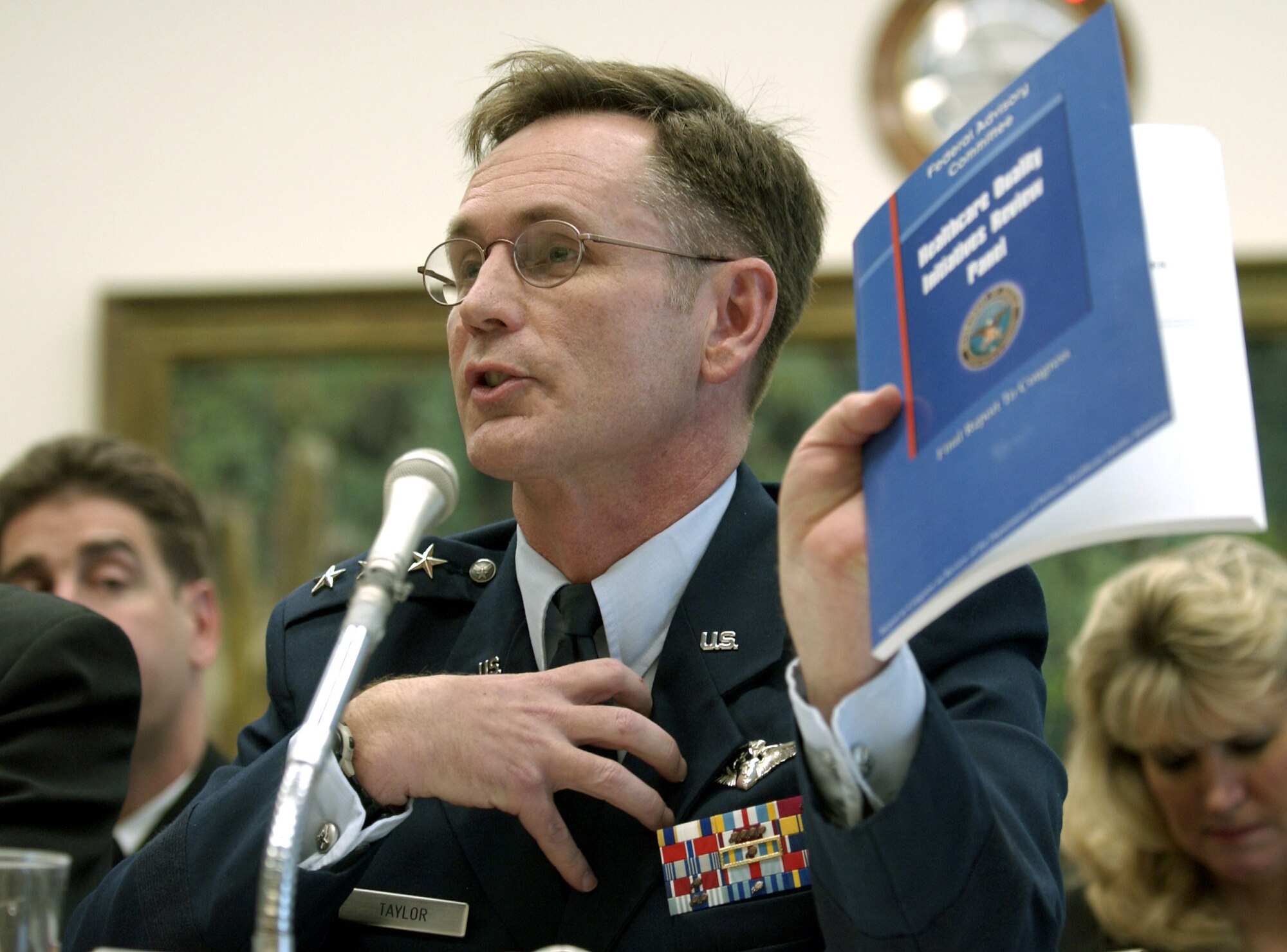 WASHINGTON -- Lt. Gen. (Dr.) George Peach Taylor Jr., Air Force surgeon general, discusses the "Healthcare Quality Initiatives Review Panel Report" with members of the House Armed Services Committee's total force subcommittee March 18.  (U.S. Air Force photo by Master Sgt. Jim Varhegyi)