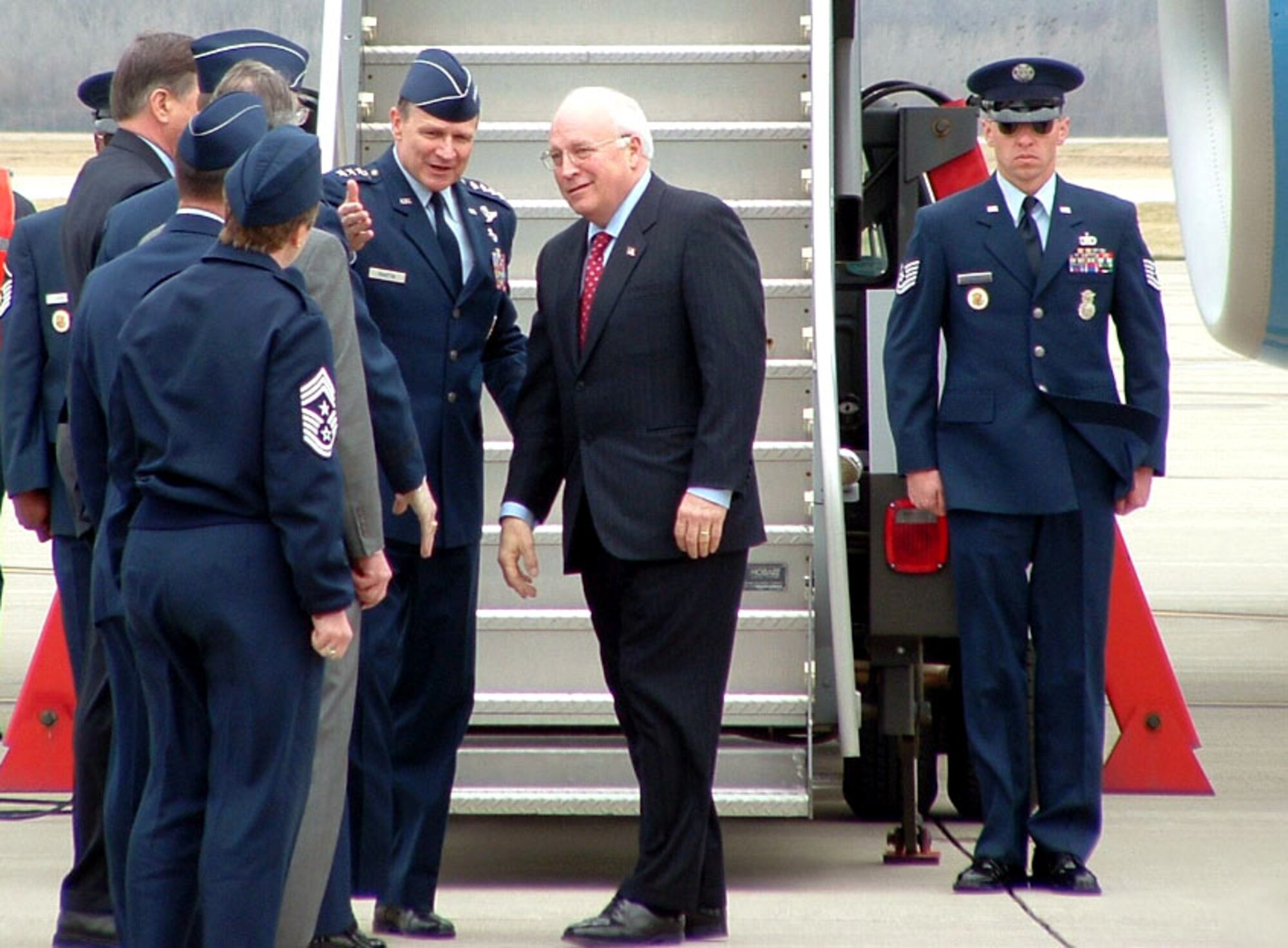 WRIGHT-PATTERSON AIR FORCE BASE, Ohio -- Gen. Greg Martin, commander of Air Force Materiel Command, greets Vice President Dick Cheney and introduces him to other base officials March 26 on the flightline here.  (U.S. Air Force photo by Sue Murphy) 