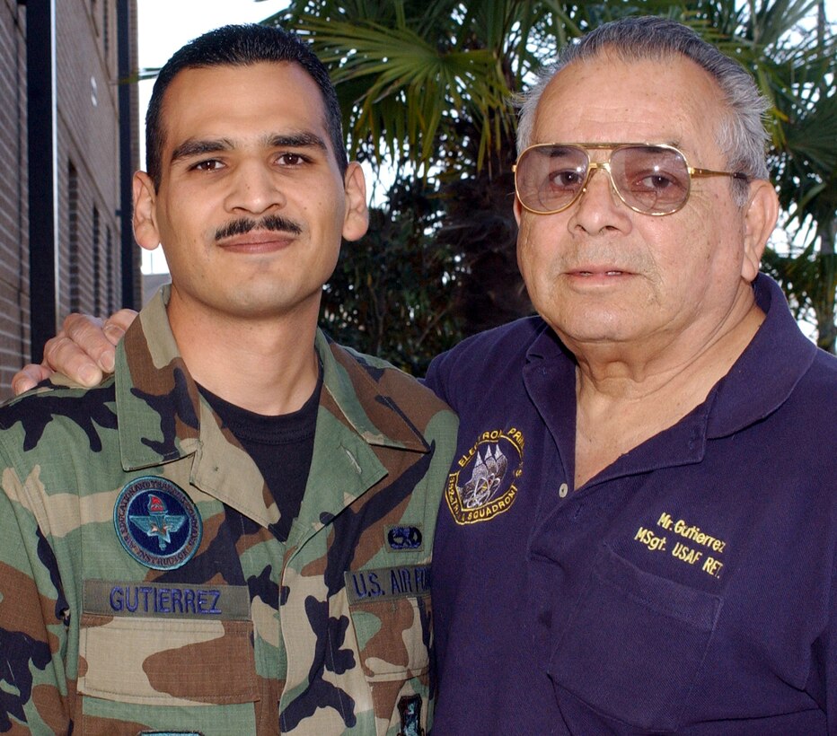 KEESLER AIR FORCE BASE, Miss. -- Staff Sgt. Victor Gutierrez teaches the same course his father, Ernesto Gutierrez, taught years ago while on active duty.  Sergeant Gutierrez is a computer, networking and cryptographic systems instructor in the 338th Training Squadron, and Mr. Gutierrez teaches electronic principles in the 332nd TRS.  (U.S. Air Force photo by Kemberly Groue)