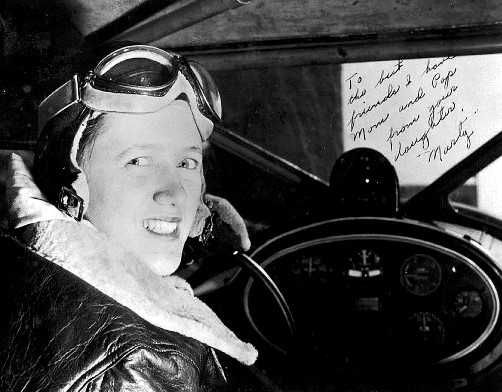 1940's -- SWEETWATER, Texas -- Marty Volkomener sits in the cockpit of her training aircraft at the start of her Women's Airforce Service Pilots class in 1943.  This signed photo is just one of the memories she has of that time.  (Courtesy photo)