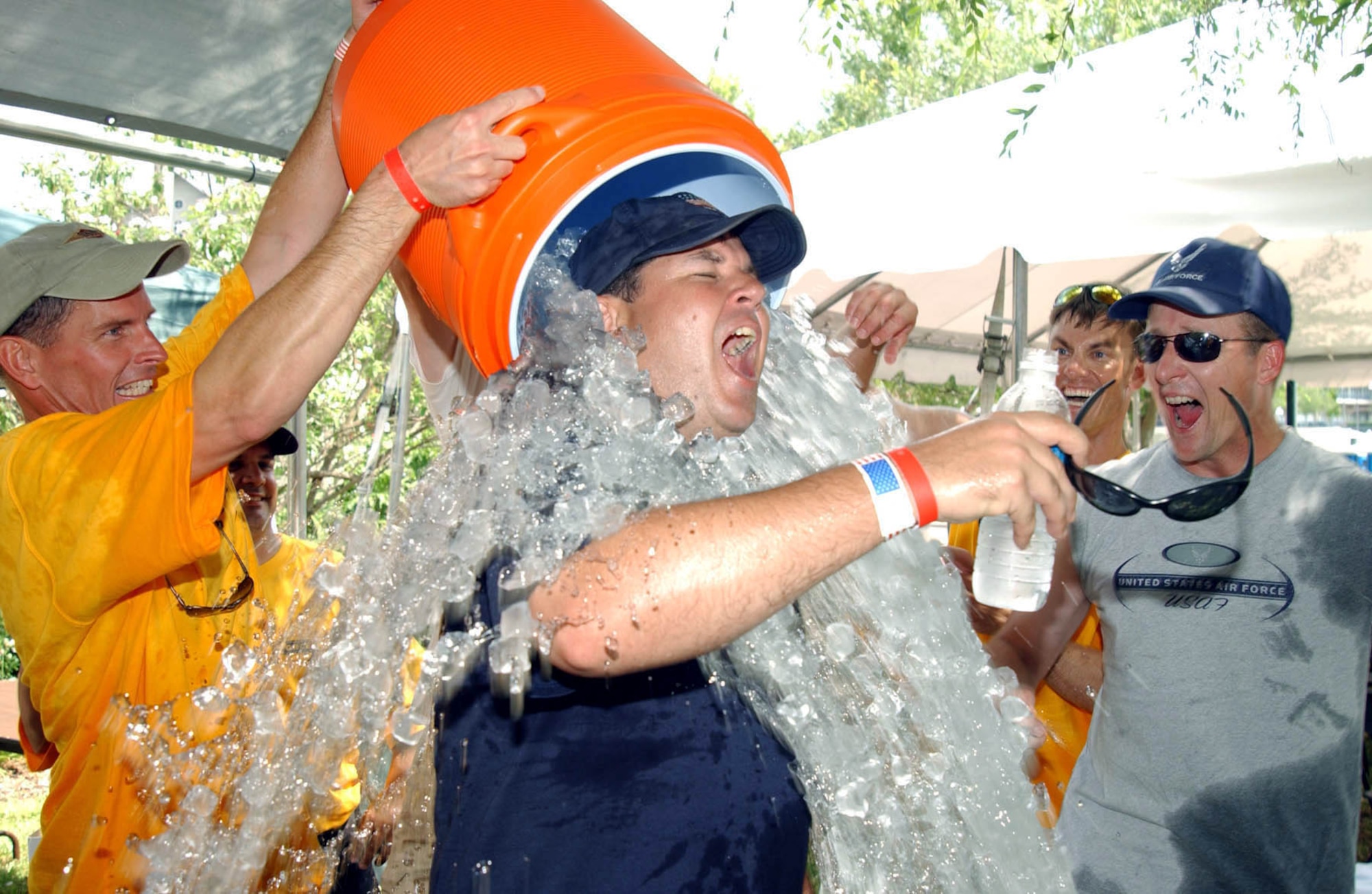 TAMPA, Fla. -- Maj. Michael Hamill, Air Force team coach for the dragon boat race, gets "cooled down" after the team's final race here May 1.  The race was held as part of the city's Asia Fest.  Major Hamill is assigned to the 310th Airlift Squadron at nearby MacDill Air Force Base.  (U.S. Air Force photo by 2nd Lt. Erin Dorrance)