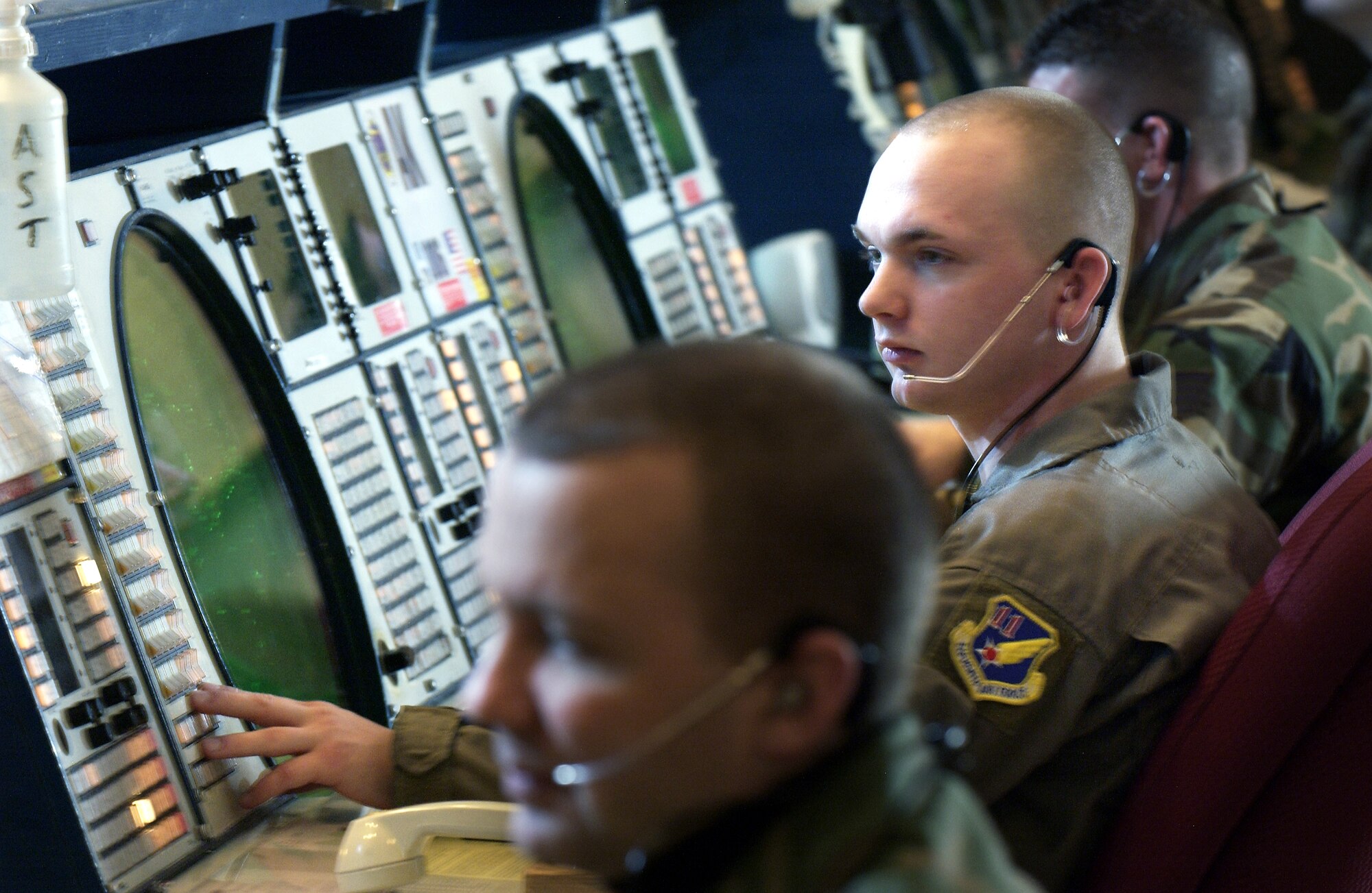 ELMENDORF AIR FORCE BASE, Alaska -- Airman 1st Class Melvin Casler, a tracking technician with the 611th Air Control Squadron here, helps monitor 1.3 million miles of Alaskan airspace as part of Operation Noble Eagle's air superiority mission over the northern frontier.  (U.S. Air Force photo by Master Sgt. Scott Wagers) 