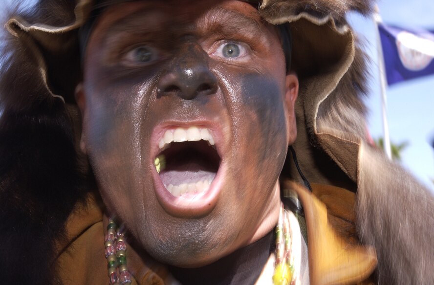 VANDENBERG AIR FORCE BASE, Calif. -- Master Sgt. Jeffery Carr, aka "The Frontiersman," pumps up his team members upon their arrival here May 2.  Guardian Challenge, the world's premier space and missile competition, is an annual four-day event that tests the wartime readiness of Air Force Space Command's Airmen in spacelift, ICBM operations, communications, maintenance, helicopter operations, security forces and food preparation.  Sergeant Carr is from the 341st Space Wing at Malmstrom Air Force Base, Mont.  (U.S. Air Force photo by Staff Sgt. Lee A. Osberry Jr.) 