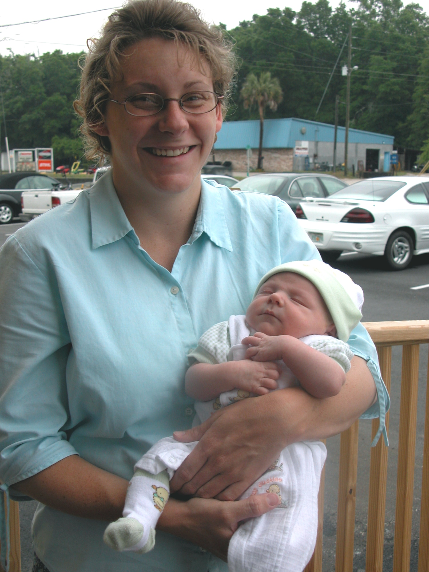 DEFUNIAK SPRINGS, Fla. -- Jennifer Cheshire stands with her son, Joshua Malachi.  He was affectionately nicknamed "bomber," after his mother's labor caused a test mission delay at nearby Eglin Air Force Base.  (U.S. Air Force photo by Tammie D. Erazo)
