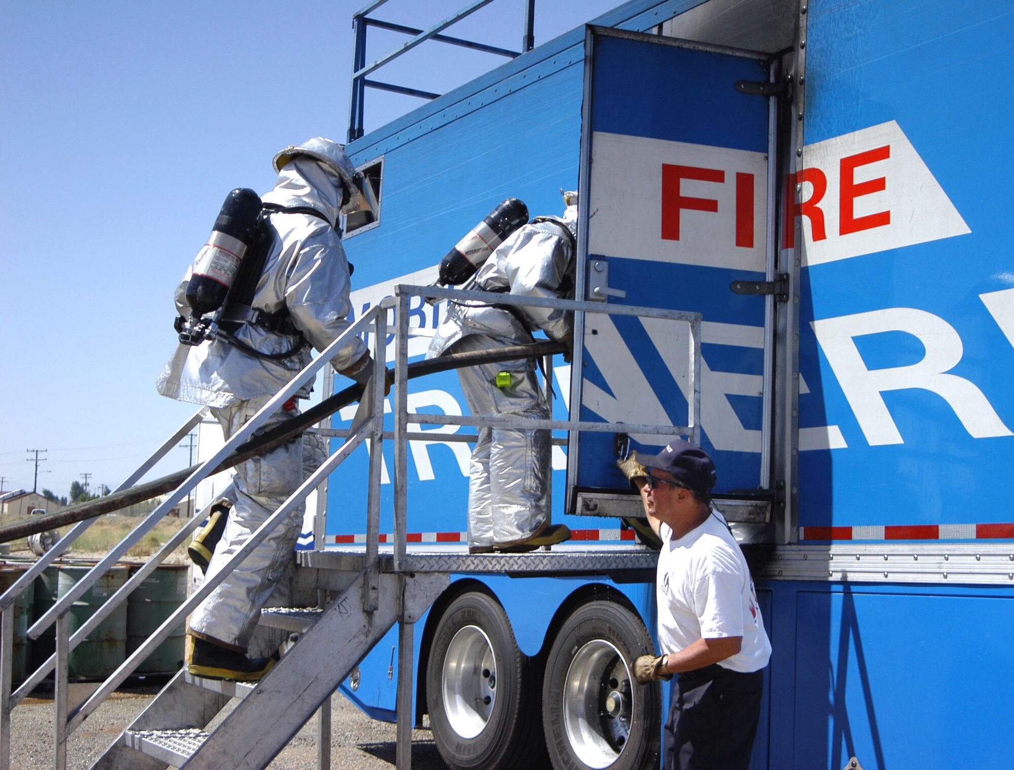 EDWARDS AIR FORCE BASE, Calif. -- Firefighters here enter a training simulator May 3.  (U.S. Air Force photo by Jackie Robertson)