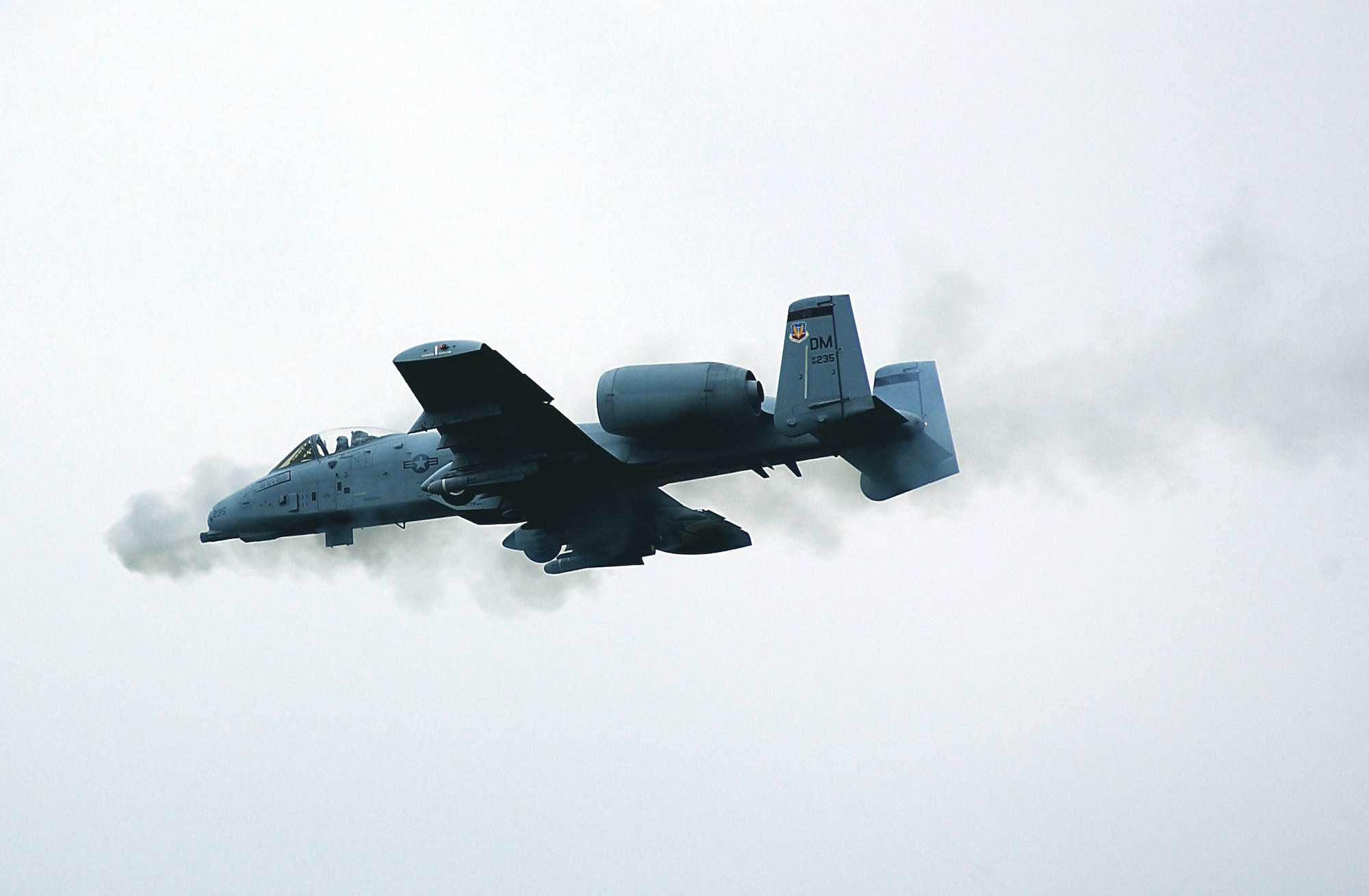 ALEXANDRIA, La.  -- An A-10 Thunderbolt II aircraft fires its 30mm GAU-8A seven barrel gatling gun on targets at Clairborne Bombing and Gunnery Range in support of Hawgsmoke 2004, a biannual A-10 bombing and tactical gunnery competition. Severe weather canceled the competition April 30. (U.S. Air Force photo by Staff Sgt. Elizabeth Conception) 