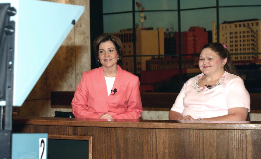 WICHITA FALLS, Texas -- Rachel Wheat (left), host for the local news' "Midday Edition," and Kimbra Lyons take a break between segments at the news station May 7.  Ms. Lyons is a grill cook at nearby Sheppard Air Force Base.  The two women swapped jobs after Ms. Lyons won a contest the news station was having.  (U.S. Air Force photo by Airman 1st Class Jacque Lickteig)