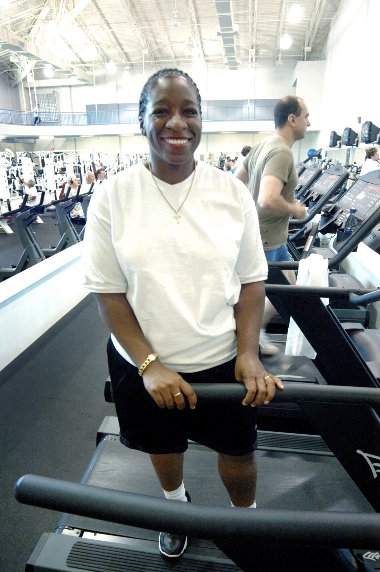 ROBINS AIR FORCE BASE, Ga. -- Irish Frederick exercises four to five days a week at the fitness center here.  She drinks water and eats healthy foods.  She lost more than 150 pounds and dropped 12 dress sizes.  (U.S. Air Force photo by Sue Sapp)