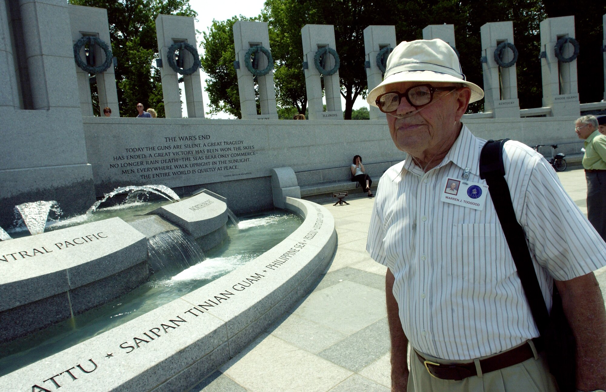 WASHINGTON -- Retired Chief Master Sgt. Warren J. Toogood, visited the World War II Memorial here May 11.  Chief Toogood was a supply specialist in the Pacific during World War II, and he retired from the Air Force after a 24-year career.  The memorial is nestled between the Lincoln Memorial and Washington Monument on the National Mall.  It will be officially dedicated Memorial Day weekend.  (U.S. Air Force photo by Master Sgt. Jim Varhegyi) 