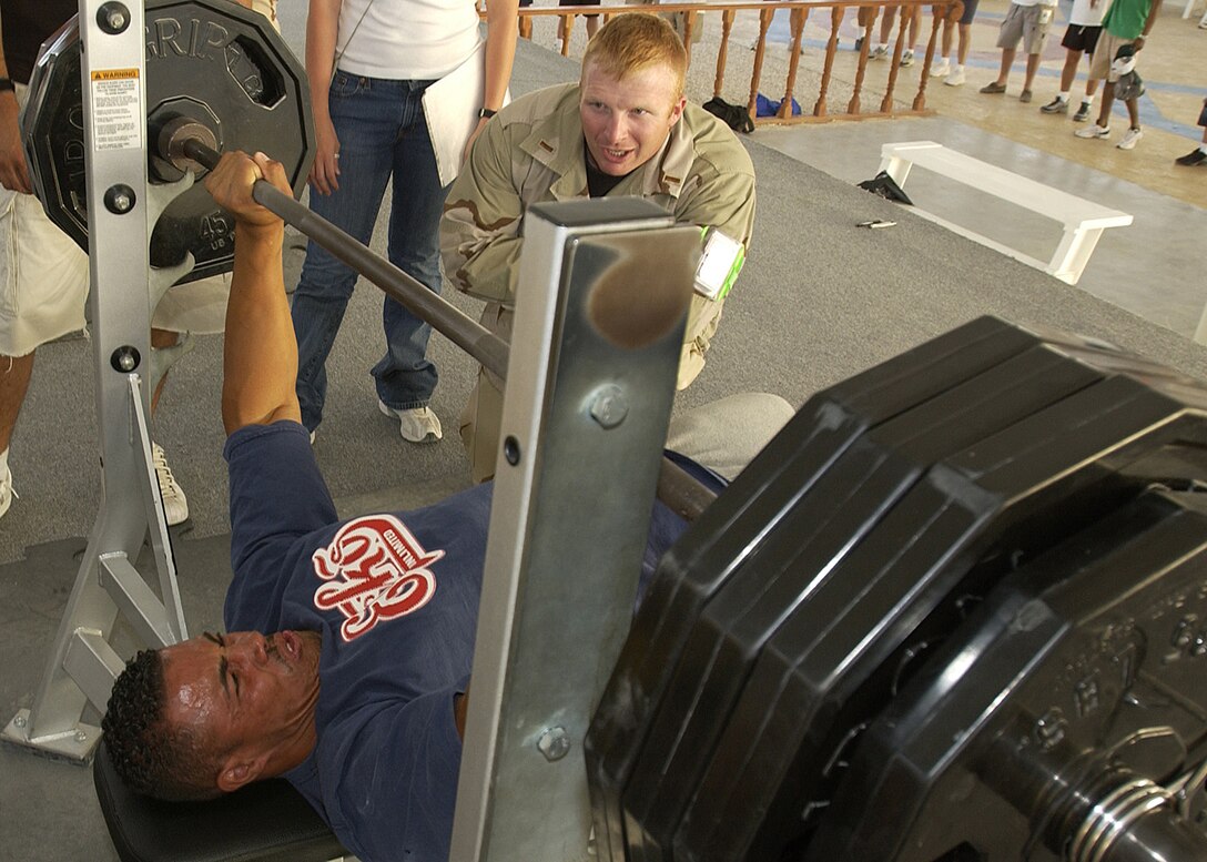 SOUTHWEST ASIA (AFPN) -- Senior Airman Edwin Lopez bench presses 385 pounds in the heavyweight division during a competition at a forward-deployed location. He went on to press 405 pounds to win the competition. Airman Lopez is assigned to the 379th Expeditionary Civil Engineer Squadron and is deployed from Andersen Air Force Base, Guam. (U.S. Air Force photo by Tech. Sgt. Demetrius Lester)