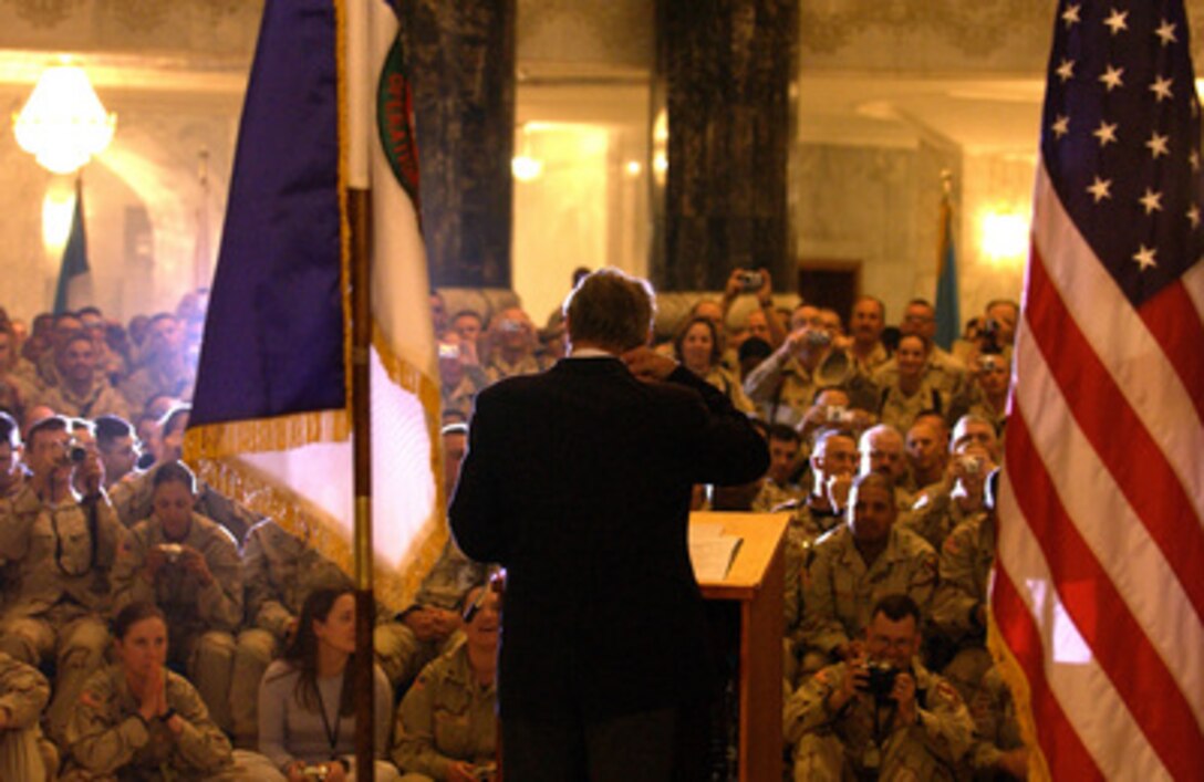 Secretary of Defense Donald H. Rumsfeld talks to soldiers, Marines and airmen in the Al Faw Palace at Camp Victory, Iraq, on May 13, 2004. Rumsfeld and Chairman of the Joint Chiefs of Staff Gen. Richard B. Myers are in Iraq to visit the troops in Baghdad and Abu Ghraib. 