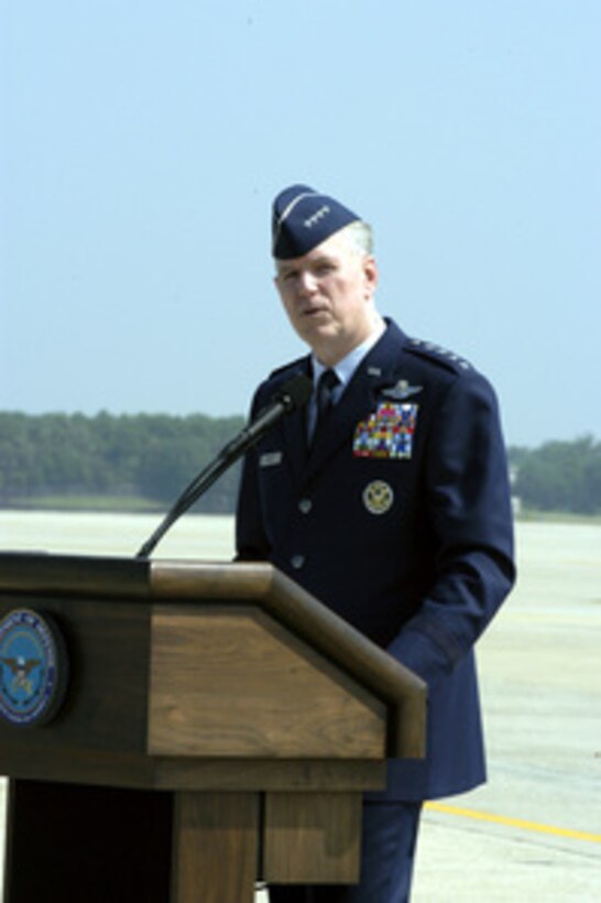 Chairman of the Joint Chiefs of Staff Gen. Richard B. Myers, U.S. Air Force, introduces Deputy Secretary of Defense Paul Wolfowitz at the opening ceremony of the annual Armed Forces Open House and Air Show at Andrews Air Force Base, Md., on May 14, 2004. 
