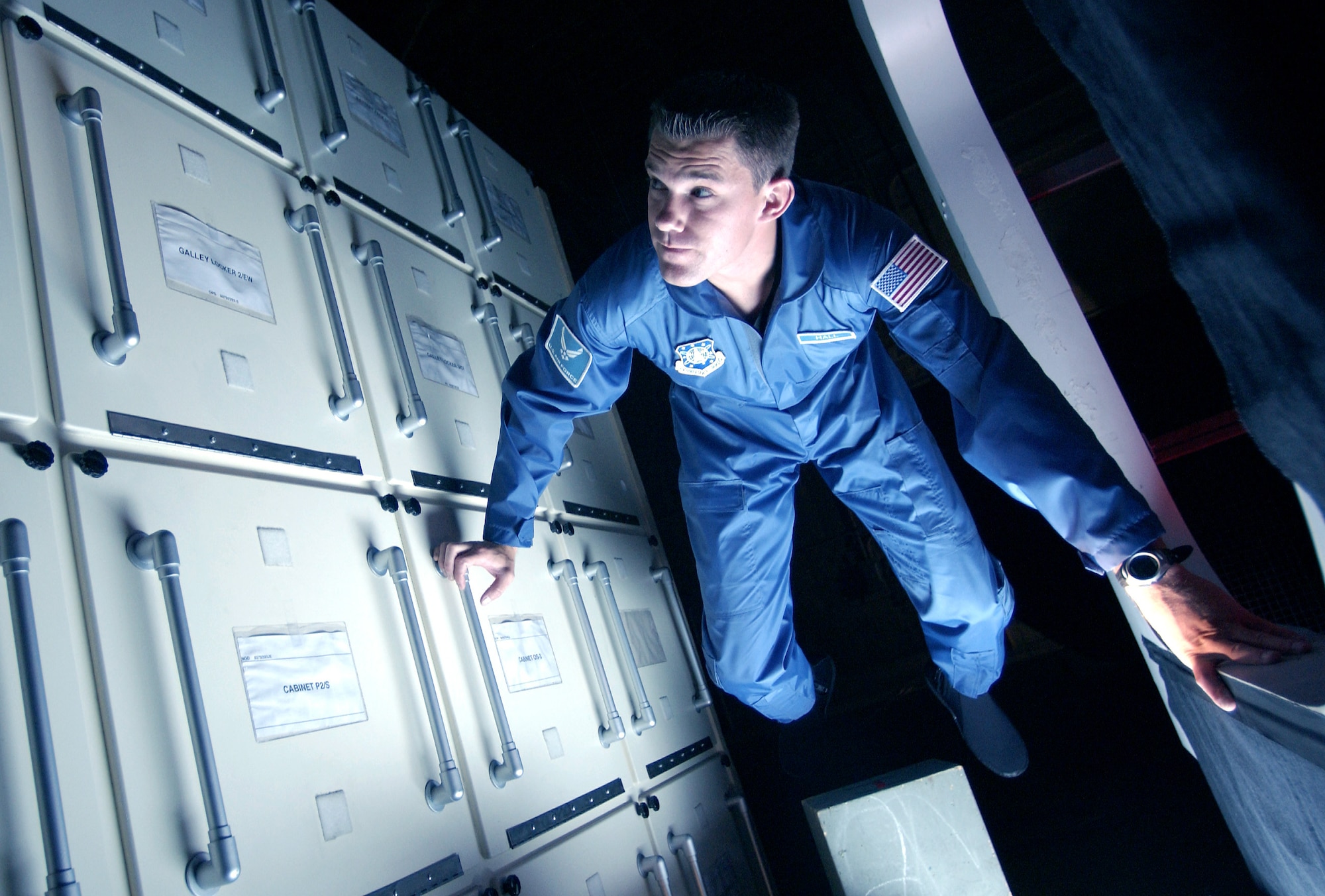 HOLLYWOOD -- Capt. Ryan Hall floats through a scene during filming of new Air Force television commercials at Universal Studios here May 19.  Four ads being filmed over two weeks in several locations throughout California will air in the fall.  Captain Hall works with space systems at Los Angeles Air Force Base, Calif.  (U.S. Air Force by Master Sgt. Jim Varhegyi)