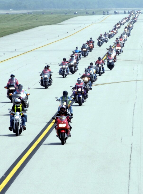 WRIGHT-PATTERSON AIR FORCE BASE, Ohio -- About 230 motorcyclists celebrated the kickoff of a motorcycle mentoring campaign here May 21 with a ride down a taxiway.  The campaign brings new motorcyclists together with experienced riders to learn about the hazards of motorcycling.  (U.S. Air Force photo by Spencer P. Lane)
