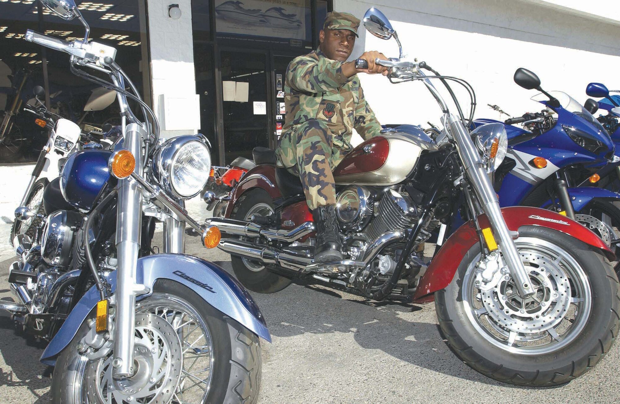 NELLIS AIR FORCE BASE, Nev. -- Senior Airman Roger Thomas won the showcase showdown on the "Price is Right" and walked away with two Yamaha V-Star motorcycles, along with many other prizes.  The show is scheduled to air May 27.  Check local listings for times.  He is an information manager with Air Combat Command Training Support Squadron's Detachment 8 here.  (U.S. Air Force photo by Senior Airman Brian Ferguson)