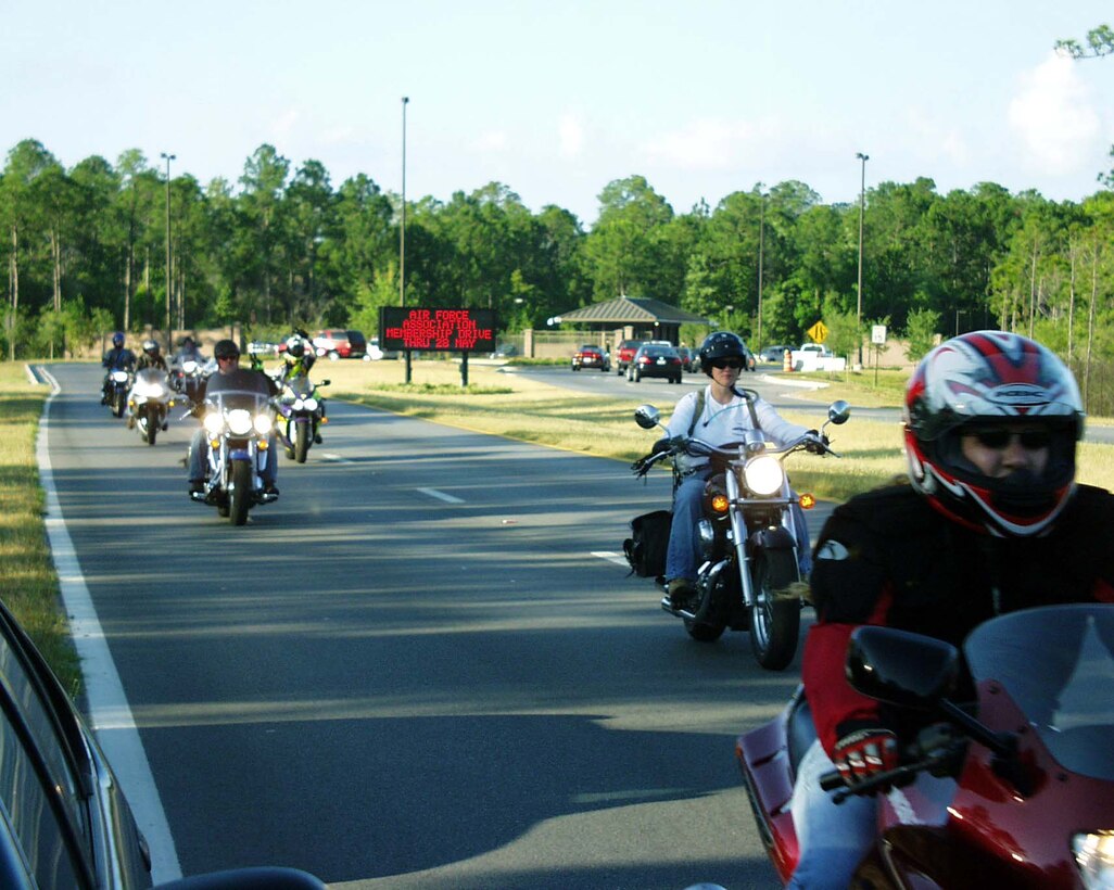 HURLBURT FIELD, Fla. -- Motorcyclists from the Sentinels of Freedom, Hurlburt Field's motorcycle club, ride out the gate here on their way to the Vietnam Veterans Memorial in Washington to honor all those who paid the ultimate price for freedom.  They are participating in "Rolling Thunder," an annual procession that draws people from across the country to the memorial.  (U.S. Air Force photo by Tech. Sgt. Daniel Oliver)