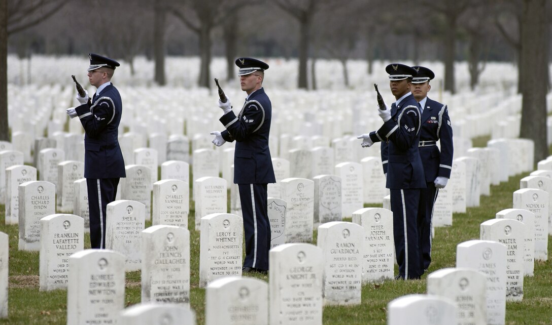 LONG ISLAND, N.Y -- Honor guard members from the 305th Air Mobility Wing at McGuire Air Force Base, N.J., honor a fallen Airman.  The nation observes Memorial Day on May 31 to remember and reflect on the selfless sacrifices of America's armed forces.  (U.S. Air Force photo by Scott H. Spitzer) 
