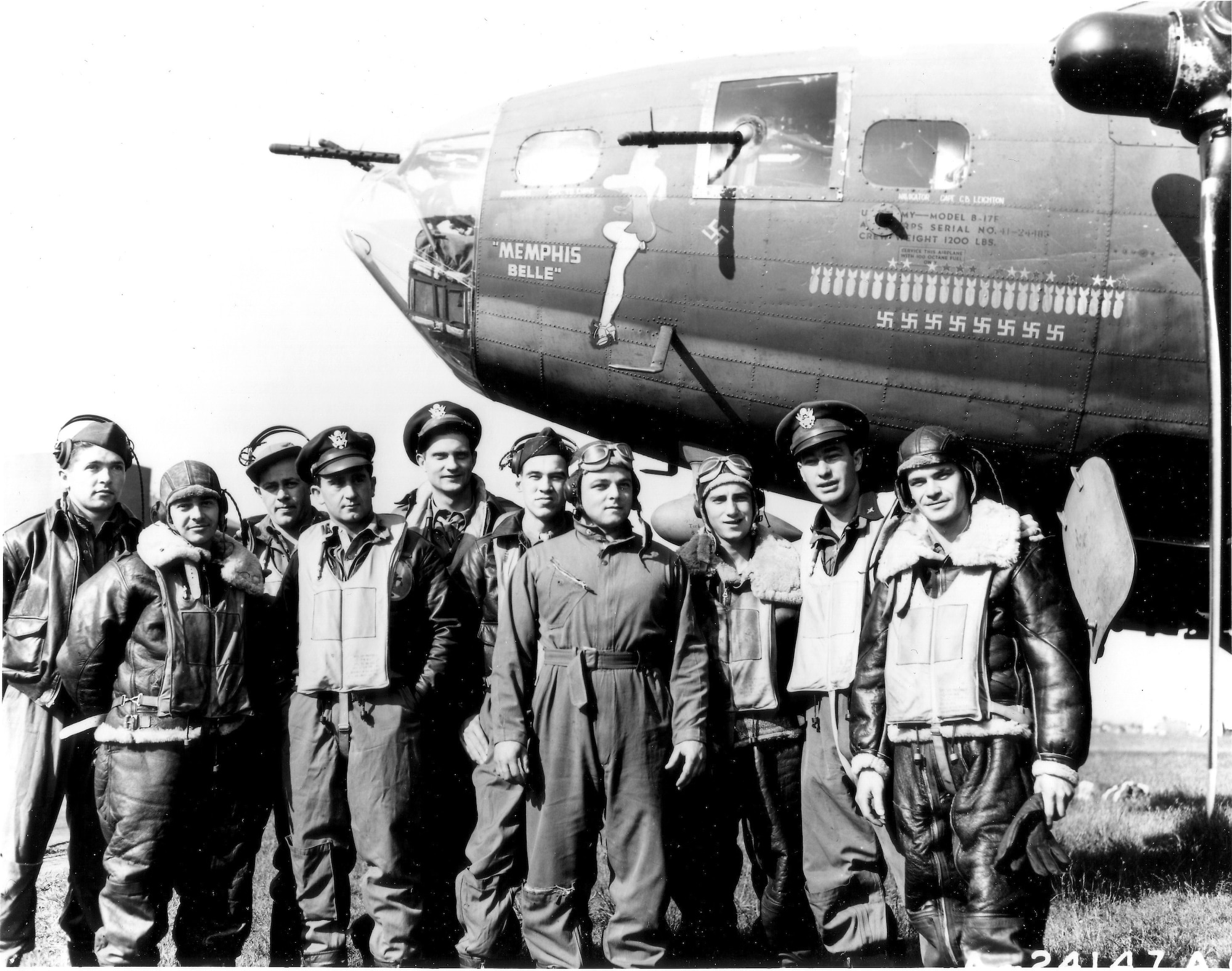 1940's -- The crew of the B-17 Flying Fortress "Memphis Belle" is shown at an air base in England after completing 25 missions over enemy territory on June 7, 1943.  They are, left to right: Tech. Sgt. Harold P. Loch of Green Bay, Wis., top turret gunner; Staff Sgt. Cecil H. Scott of Altoona, Penn., ball turret gunner; Tech. Sgt. Robert J, Hanson of Walla Walla, Wash., radio operator; Capt. James A. Verinis, New Haven, Conn., co-pilot; Capt. Robert K. Morgan of Ashville, N. C., pilot; Capt. Charles B. Leighton of Lansing, Mich., navigator; Staff Sgt. John P. Quinlan of Yonkers, N. Y., tail gunner; Staff Sgt. Casimer A. Nastal of Detroit, Mich., waist gunner; Capt. Vincent B. Evans of Henderson, Texas, bombardier and Staff Sgt. Clarence E. Wichell of Oak Park, Ill., waist gunner.