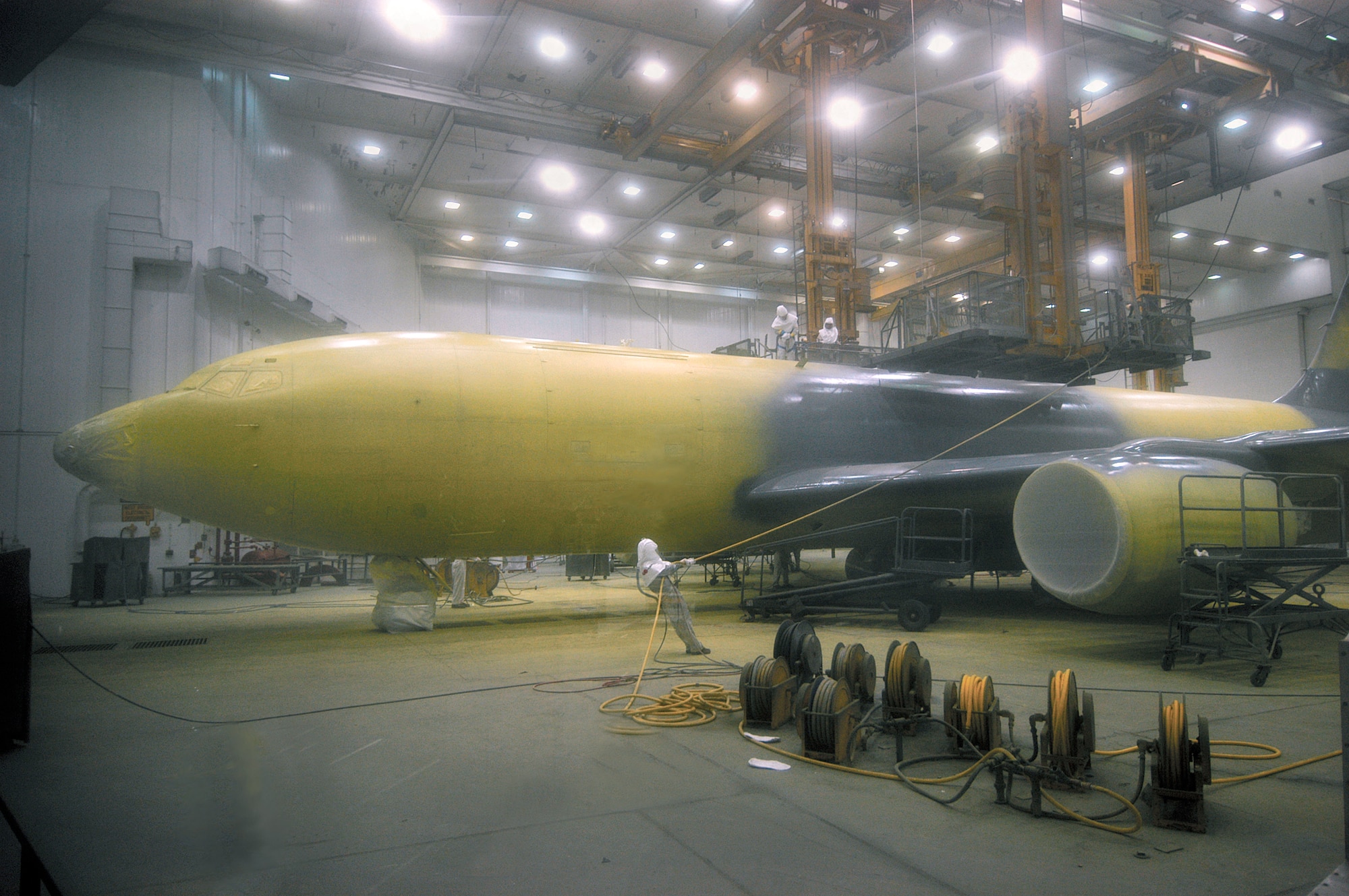 TINKER AIR FORCE BASE, Okla. -- Workers here put the first coat of paint on a KC-135 Stratotanker.  (U.S. Air Force photo by Margo Wright)
