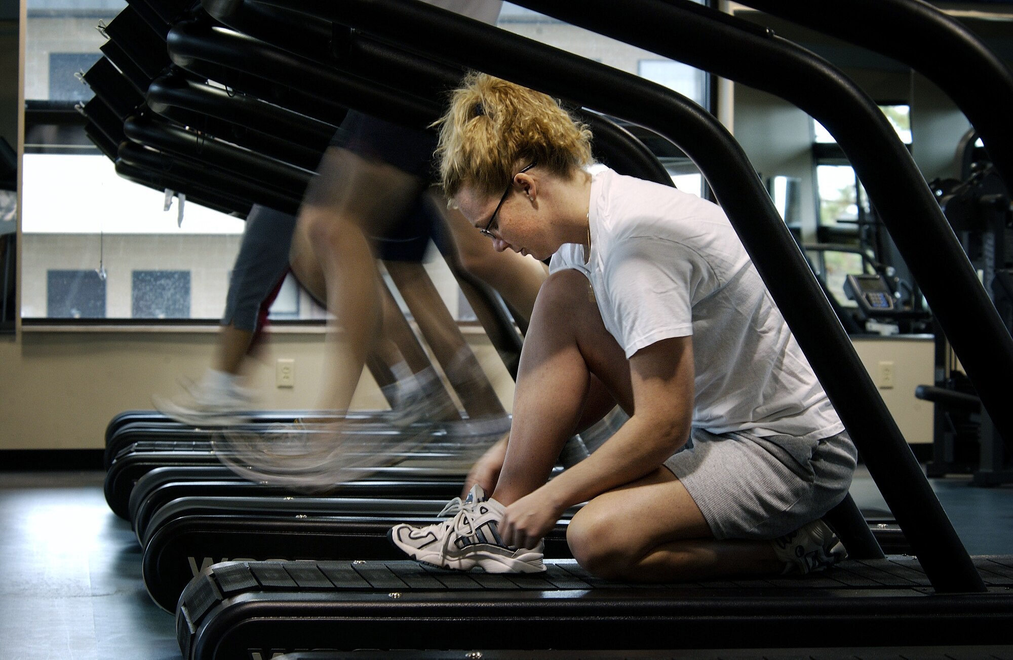 HURLBURT FIELD Fla. -- Denise Borough prepares to run on a treadmill at the Riptide fitness center here.  The patrons can dine downstairs and work out upstairs.  Mrs. Borough is married to Tech. Sgt. Donelly Borough of the 16th Special Operations Squadron.  (U.S. Air Force photo by Master Sgt. Efrain Gonzalez)
