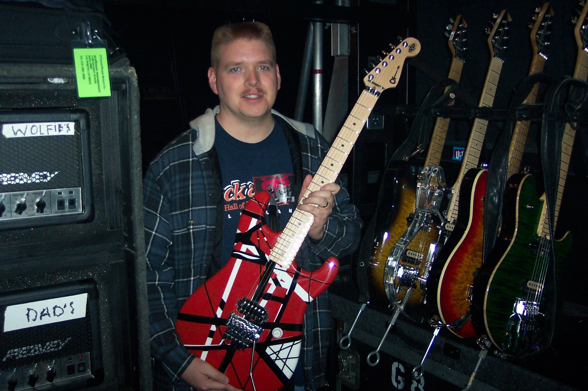 SPOKANE, Wash. (AFPN) - Handling Eddie Van Halen's guitar was just one of the benefits Staff Sgt. Scott Viers enjoyed after winning a local radio station contest.  Sergeant Viers won a spot as road crew member for the legendary rock 'n' roll band, Van Halen.  He is noncommissioned officer in charge of personnel programs for the 93rd Air Refueling Squadron at nearby Fairchild Air Force Base.  (Courtesy photo)