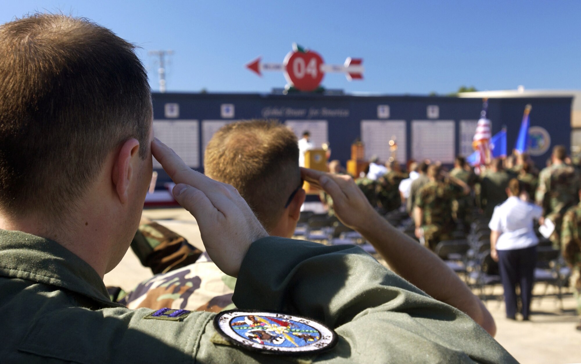 TYNDALL AIR FORCE BASE, Fla. -- Capt. Chris Jarrett salutes during the opening ceremony of William Tell 2004.  This is the 50th anniversary of the competition that tests an aircrew's ability to perform under combat conditions.  Two weeks of competition will challenge pilots, weapons loaders and maintainers from five F-15 Eagle fighter squadrons.  Captain Harrett is a weapons director from the Oregon Air National Guard's 123rd Fighter Squadron at Portland.  (U.S. Air Force photo by Tech. Sgt. Ben Bloker)