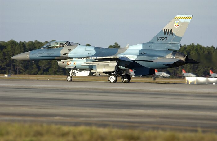 TYNDALL AIR FORCE BASE, Fla. – An F-16 Fighting Falcon from Nellis Air Force Base, Nev., prepares to take off and fly as a team aggressor during William Tell 2004 here Nov. 8.  The two-week competition challenges pilots, weapons loaders and maintainers from five F-15 fighter wings.  (U.S. Air Force photo by Staff Sgt. Josef Cole)  