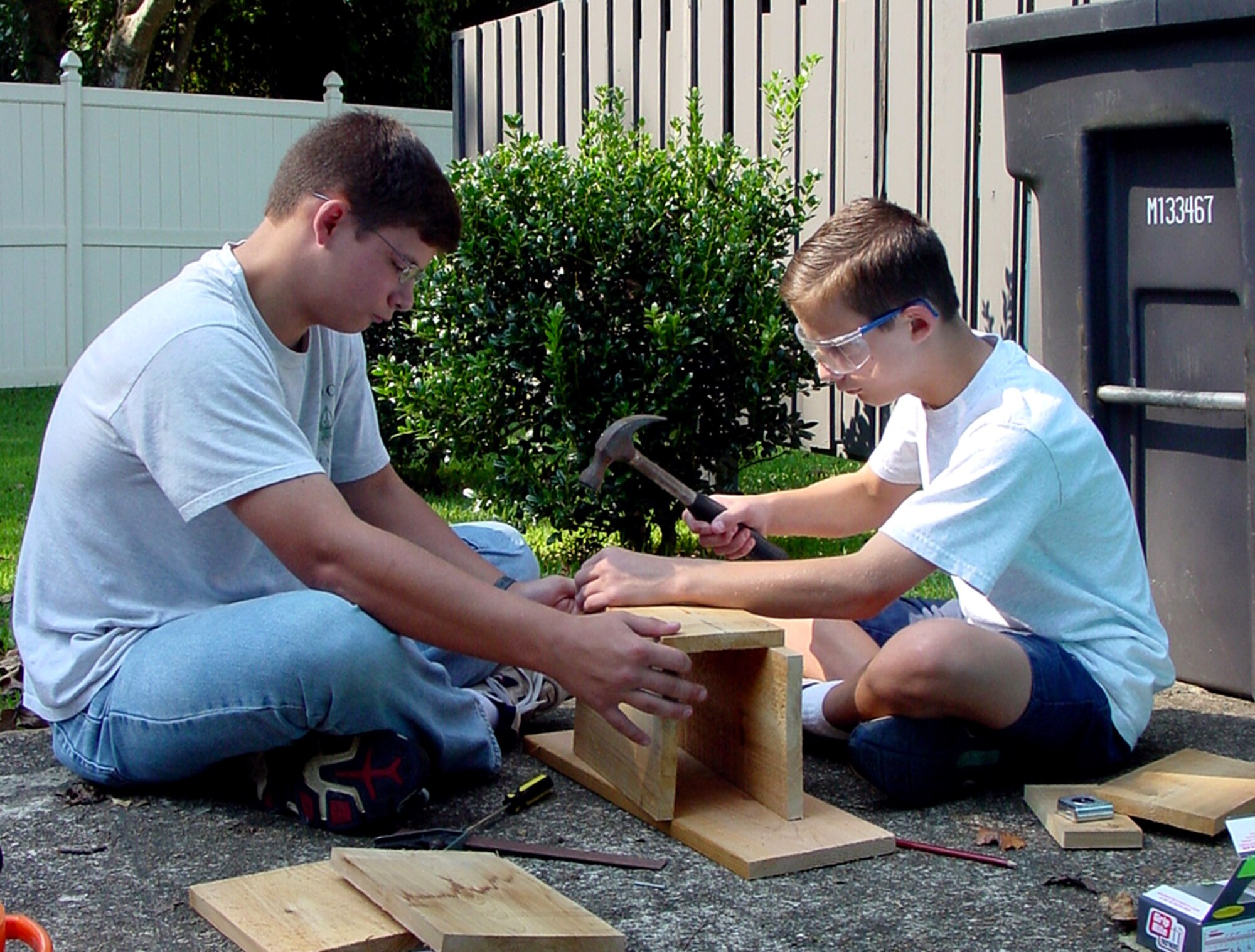 COLUMBUS AIR FORCE BASE, Miss. -- Boy Scouts Charlie Burgess and his brother, Jim, construct one of eight boxes that will potentially house up to 200 bats each here.  (Courtesy photo)