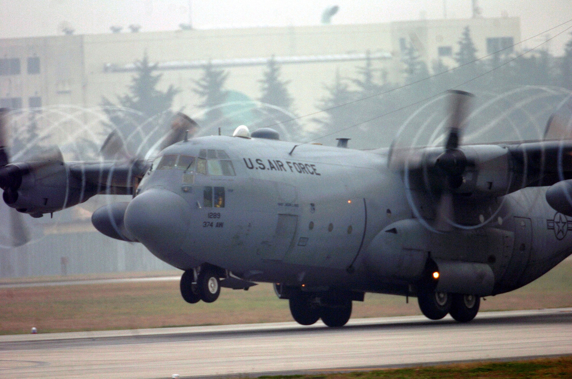 YOKOTA AIR BASE, Japan -- A C-130 Hercules aircraft from the 36th Airlift Squadron prepares to conduct a cargo air drop mission during exercise Keen Sword 2005 here Nov. 11.  (U.S. Air Force photo by Master Sgt. Val Gempis)