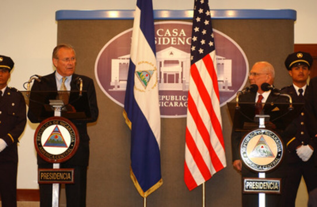 Secretary of Defense Donald H. Rumsfeld and Nicaraguan President Enrique Bolanos conduct a joint press conference in Managua, Nicaragua, on Nov. 12, 2004. Rumsfeld is in Nicaragua to meet with Bolanos and his Defense Minister Jose Guerra and to thank them for the Nicaraguan military demining and humanitarian efforts in Iraq. Rumsfeld and 33 more defense ministers from throughout the Western Hemisphere will assemble in Quito, Ecuador, on November 15th for the Defense Ministerial of the Americas conference which will focus on strengthening the inter-American security system. 