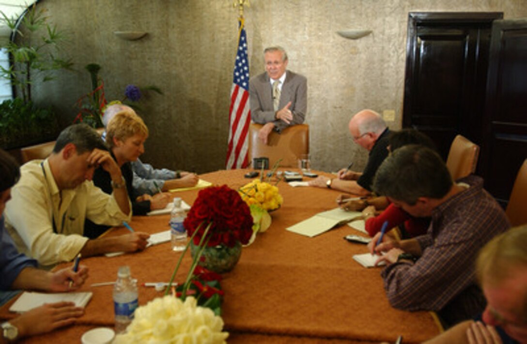Secretary of Defense Donald H. Rumsfeld briefs reporters in Quito, Ecuador, on Nov. 15, 2004. Rumsfeld and 33 more defense ministers from throughout the Western Hemisphere are in Quito to attend the Defense Ministerial of the Americas conference that will focus on strengthening the inter-American security system. 