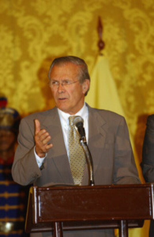 Secretary of Defense Donald H. Rumsfeld responds to a reporter's question during a joint press conference with Ecuadorian Minister of Defense Nelson Herrera at the Presidential Palace in Quito, Ecuador, on Nov. 14, 2004. Rumsfeld and 33 more defense ministers from throughout the Western Hemisphere are assembling in Quito to attend the Defense Ministerial of the Americas conference that will focus on strengthening the inter-American security system. 