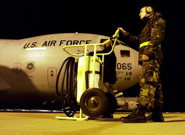 BIGGS ARMY AIR FIELD, Texas -- Senior Airman David Lynch waits for an engine start on a C-17 Globemaster III during a Composite Force Operations exercise here recently.  Airman Lynch is assigned to the 437th Aircraft Maintenance Squadron at Charleston Air Force Base, S.C.  (U.S Air Force photo by Staff Sgt. Suzanne M. Jenkins)
