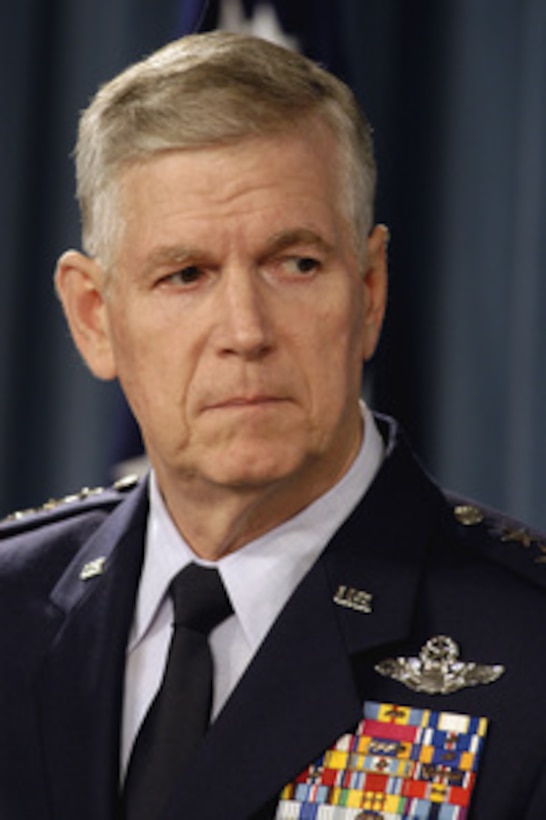 Chairman of the Joint Chiefs of Staff Gen. Richard B. Myers, U.S. Air Force, listens to a reporter's question during a Pentagon press briefing on Nov. 23, 2004. Myers joined Secretary of Defense Donald H. Rumsfeld to provide reporters with an operation update. 