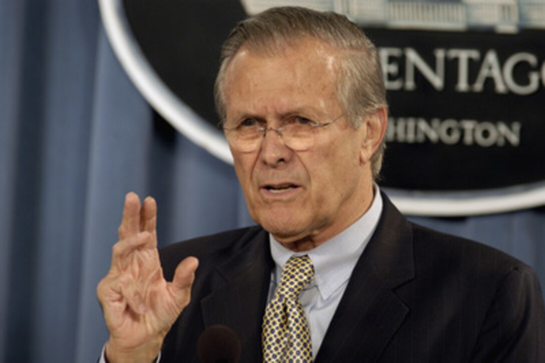 Secretary of Defense Donald H. Rumsfeld responds to a reporter's question during a Pentagon press briefing on Nov. 23, 2004. Rumsfeld was joined by Chairman of the Joint Chiefs of Staff Gen. Richard B. Myers, U.S. Air Force. 