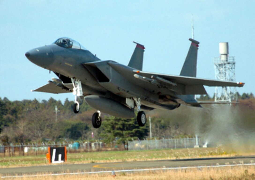 A U.S. Air Force F-15 Eagle aircraft takes off for a mission from Hyakuri Air Base, Japan, during Exercise Keen Sword 05 on Nov. 17, 2004. Keen Sword 05 is designed to increase the defensive readiness of Japanese and American forces through training in air, ground, and sea operations and improve interoperability between the two countries' forces. The F-15 is assigned to the 67th Fighter Squadron, Kadena Air Base, Japan. 