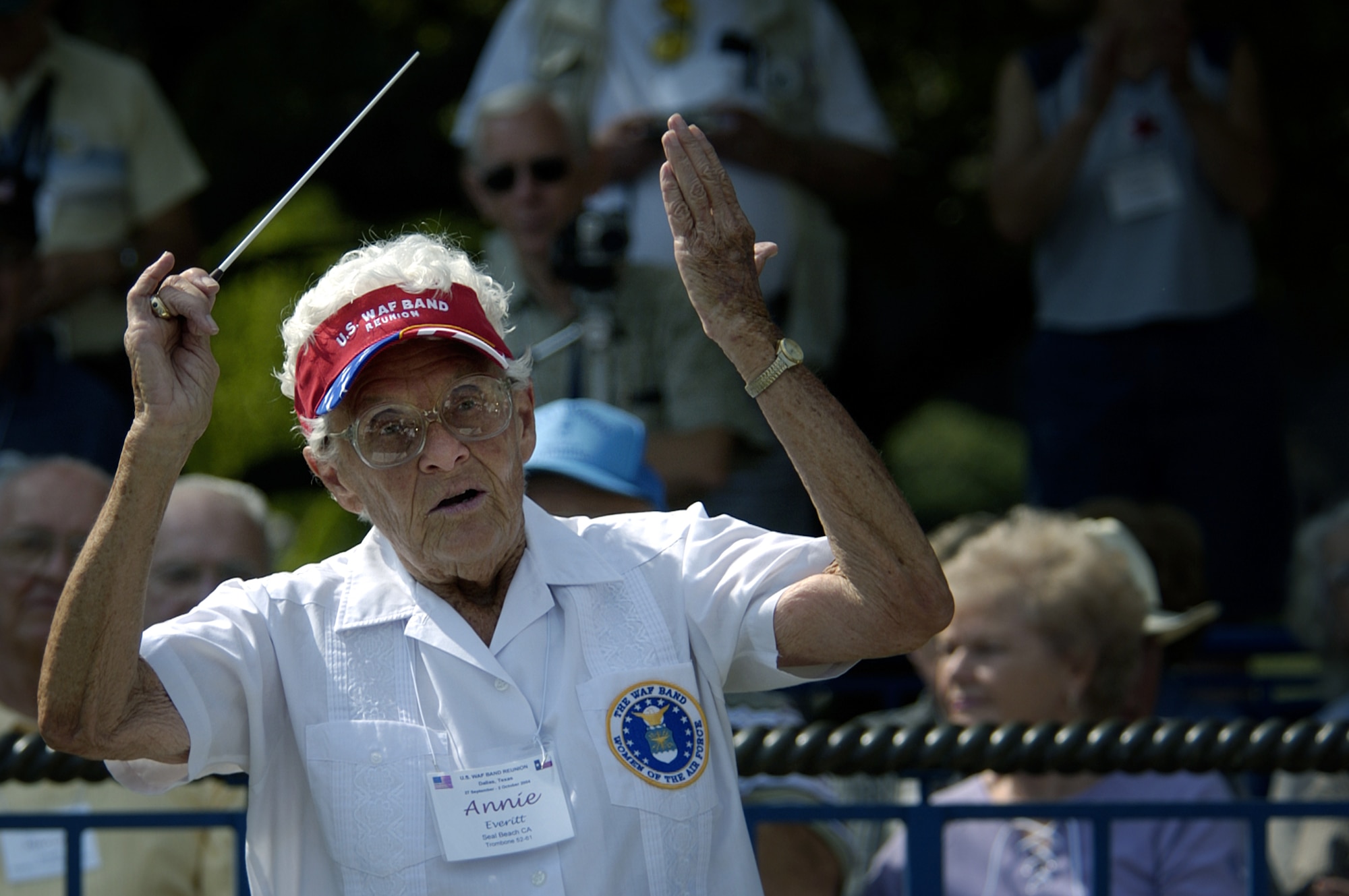 DALLAS -- Annie Everitt, a former member of the U.S. Air Force Women in the Air Force Band, leads her fellow musicians during a concert here at this year's Texas State Fair.  At age 80, Ms. Everitt is the oldest participant at this year's WAF band reunion.  Her time with the band spanned nine years from 1952 to 1961.  While with the band, she was a trombone player and also the band's alternate conductor.  (U.S. Air Force photo by Master Sgt. Efrain Gonzalez)