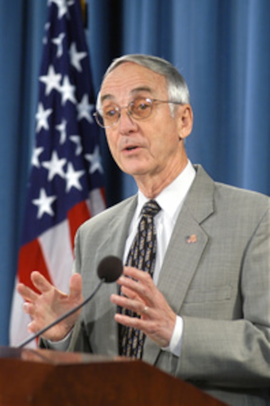 Secretary of the Navy Gordon England provides an update briefing on the progress of the combatant status review tribunals being conducted at Guantanamo Bay Naval Station, Cuba, on Oct. 1, 2004. The hearings provide detainees from the war on terrorism the opportunity to contest their detention as enemy combatants and have been in progress since late July. England reported that despite some delays from recent hurricane activity in the region, the hearings are on track to be completed by the end of the year. 