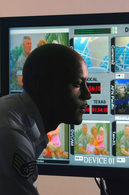 YOKOTA AIR BASE, Japan -- Staff Sgt. Norris Agnew uses digital-editing equipment to prepare a nightly "Pacific Report" newscast.  Air Force News Agency has more than 480 Air Force and Army military and civilian people assigned to 28 locations worldwide.  They communicate news, information and entertainment through print and electronic media -- keeping the total force, families and the American public informed during peace and war.  Sergeant Agnew is a broadcaster with the agency's Detachment 10 here.  (U.S. Air Force photo by Master Sgt. Val Gempis)