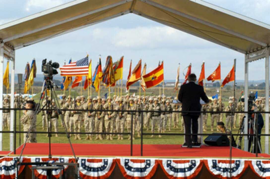 Deputy Secretary of Defense Paul Wolfowitz addresses troops of the 1st Armored Division in Wiesbaden, Germany, during ceremonies marking their homecoming from service in Iraq on Oct. 7, 2004. 