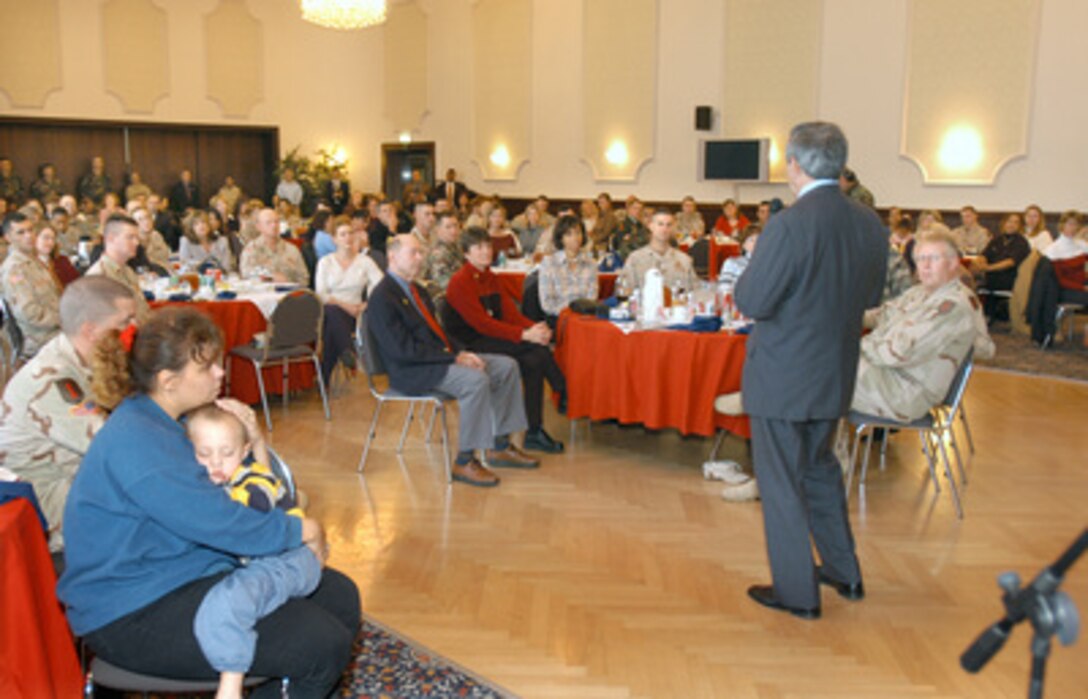 Deputy Secretary of Defense Paul Wolfowitz addresses an audience of family members of deployed soldiers of the U.S. 1st Infantry Division at Leighton Barracks, Wurzburg, Germany, on Oct. 7, 2004. Wolfowitz spoke of the important missions being undertaken by the men and women of the 1st Infantry Division in Iraq and played a special videotaped message to them from First Lady Laura Bush. 