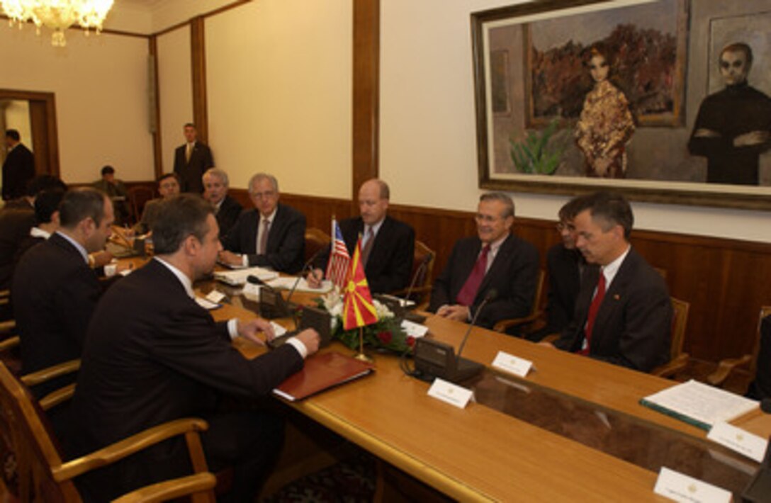Secretary of Defense Donald H. Rumsfeld (3rd from right) meets with Macedonian President Branko Crevenkovski (left) in the Parliament building in Skopje, Macedonia, on Oct. 11, 2004. Rumsfeld is in Skopje to attend a bi-lateral meeting with Macedonia officials. 
