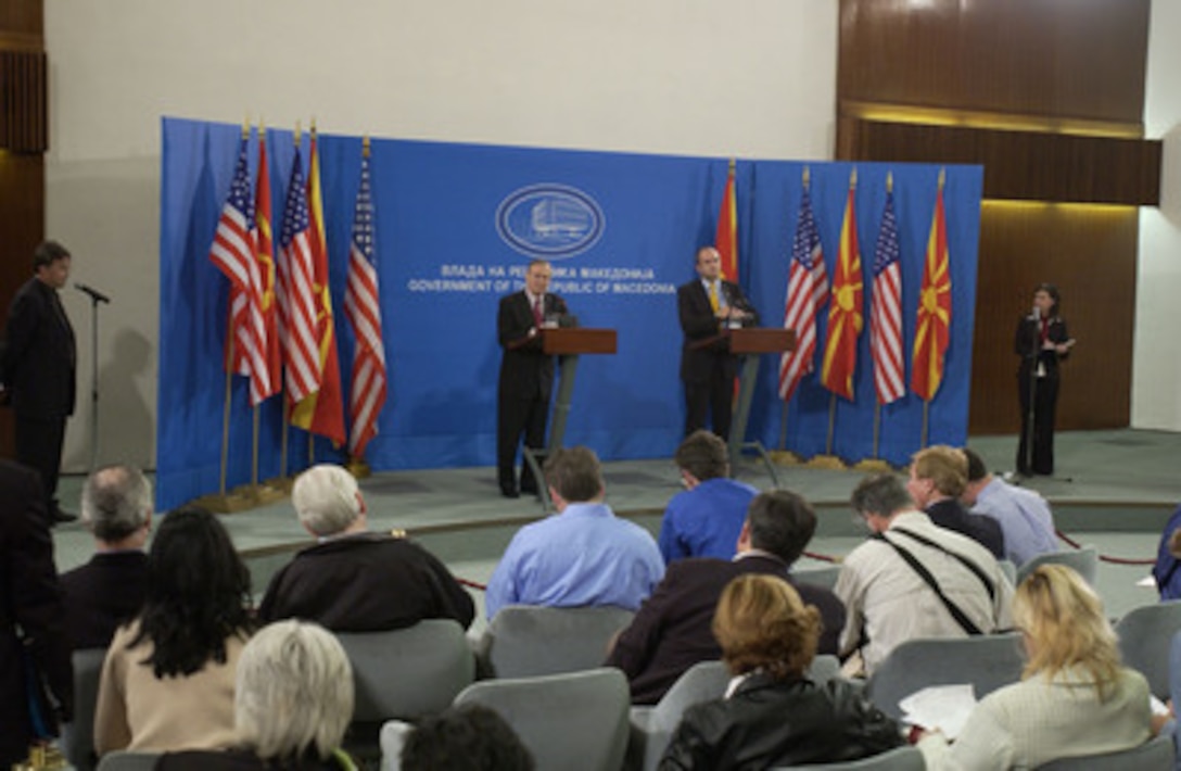 Secretary of Defense Donald H. Rumsfeld (left) and Macedonian Minister of Defense Vlado Buckovski address reporters during a joint press conference in Skopje, Macedonia, on Oct 11, 2004. Rumsfeld is in Skopje to attend a bi-lateral meeting with Macedonia officials. 