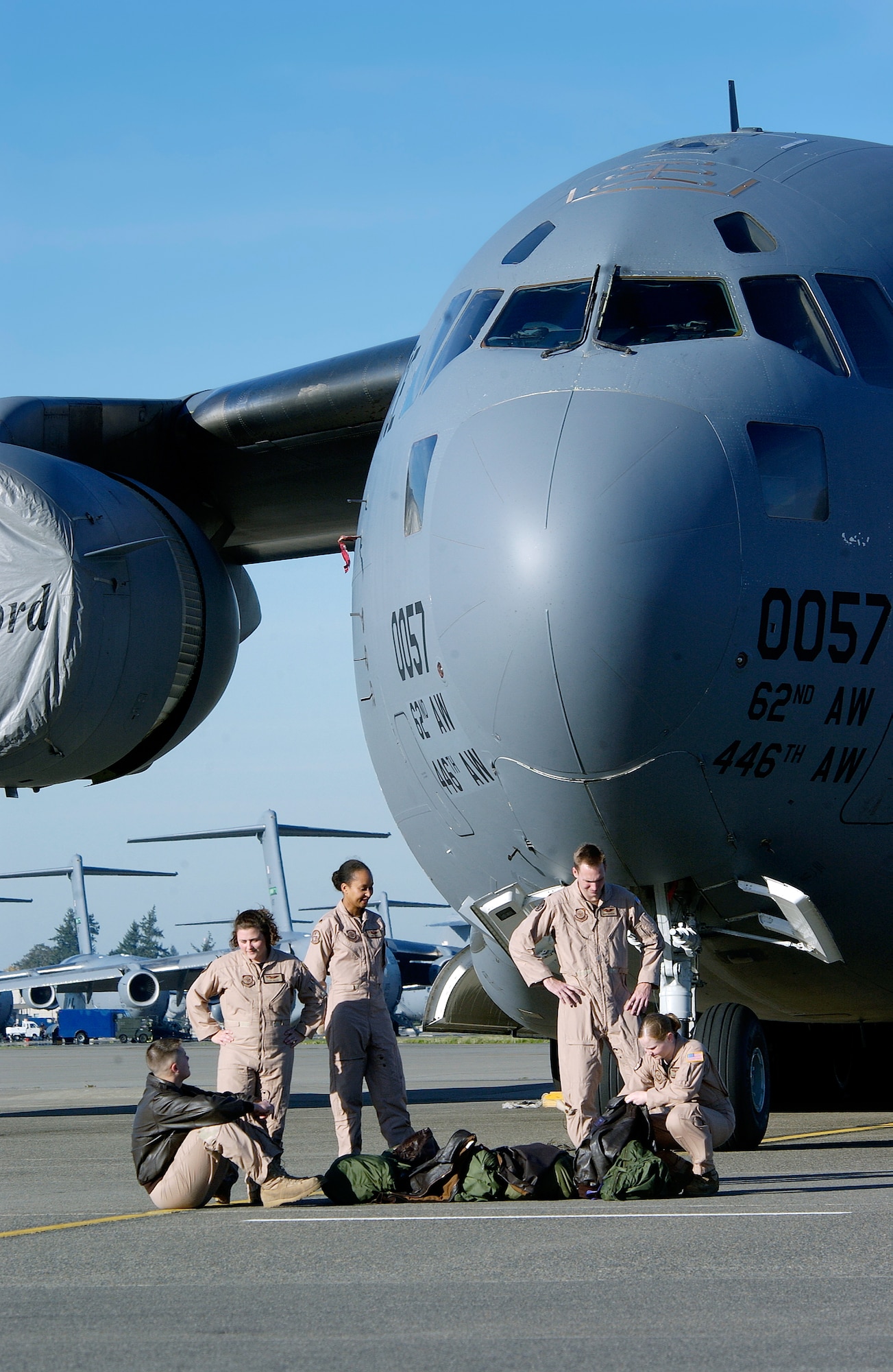 MCCHORD AIR FORCE BASE, Wash. -- Mixed active-duty and Reserve aircrews wait for their crew bus.  C-17 Globemaster III aircrews from the 62nd and 446th Airlift Wings fly long missions from here to staging areas like Rhein-Main Air Base, Germany, from where they fly missions into and out of Iraq and Afghanistan.  (U.S. Air Force photo by Master Sgt. Efrain Gonzalez) 